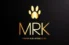 The Letters MRK in various gold colors with Marsh Run Kennels Inc. under that with a gold dog paw print above on a black background